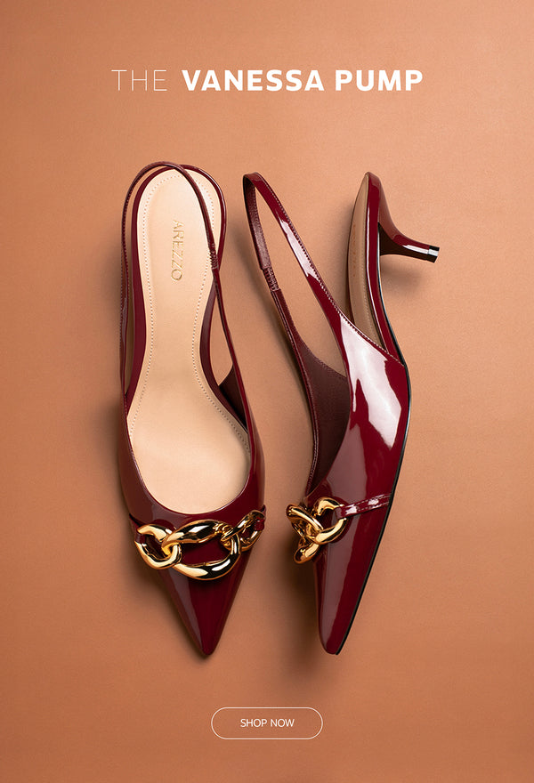 Elegant pump in burgundy, it has an upper with rounded cut detail over the instep and three organic metallic link embellishments.