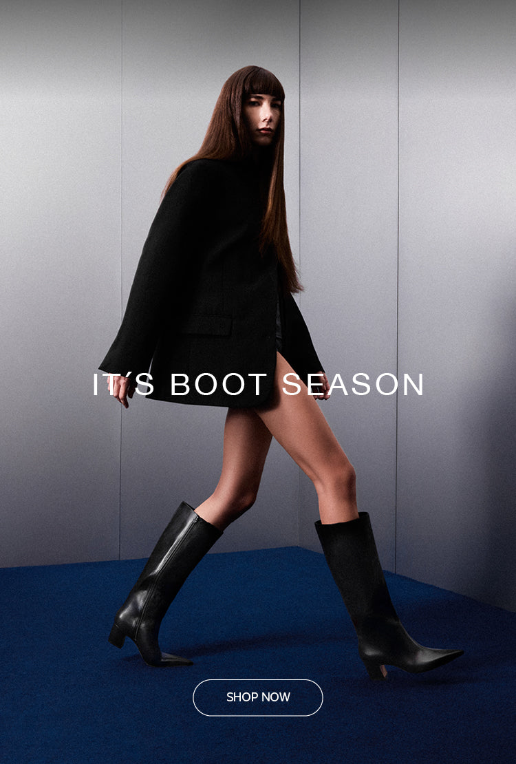 Model wearing oversized brown leather knee-high boots, styled with a beige sweater and leather skirt, from Arezzo. Text on image reads 'YOUR NEW FALL BOOTS'