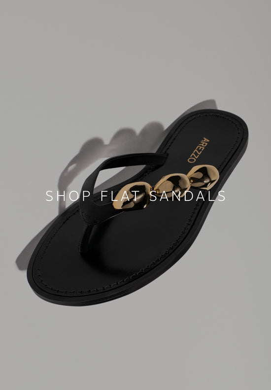 Discover sunny Flat in Black with organic-shaped gold accents 