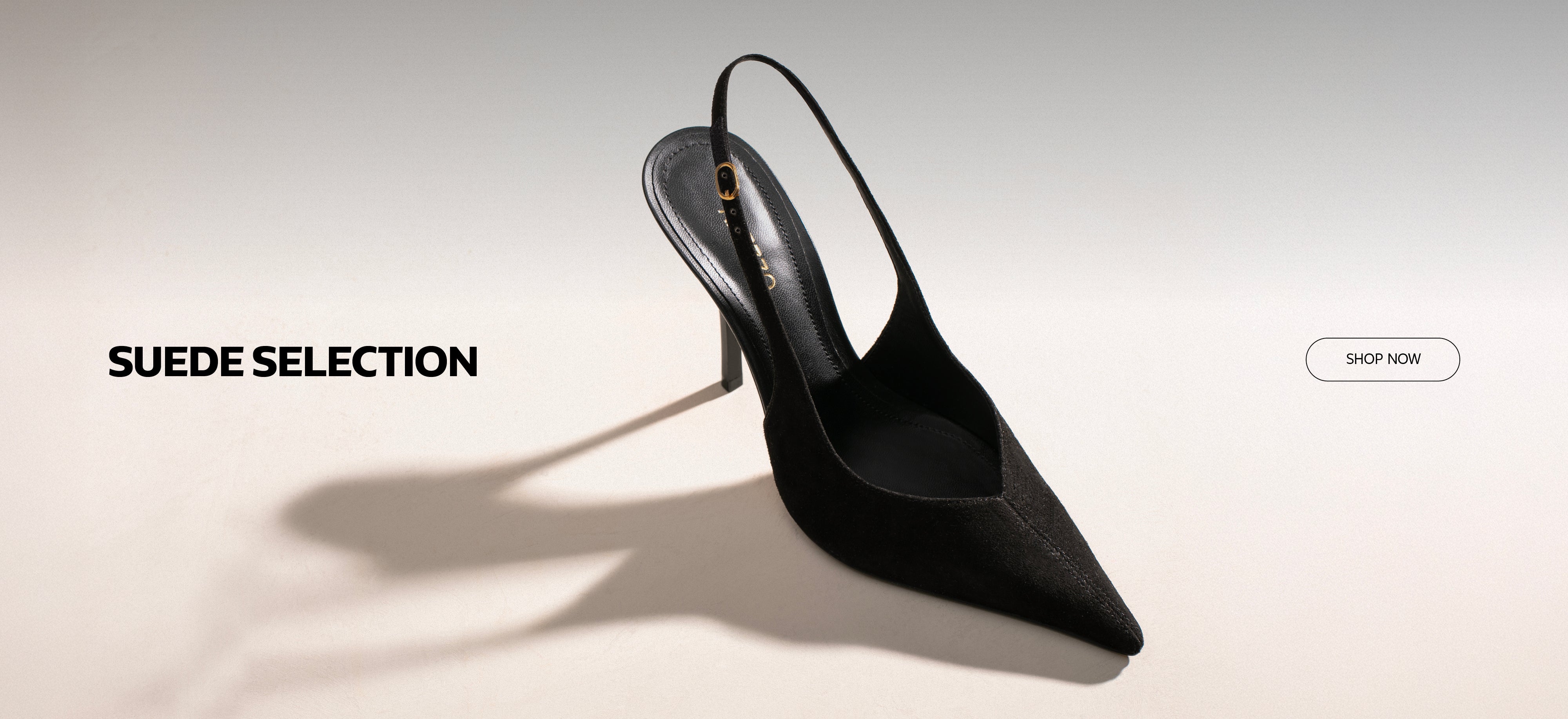 Arezzo homepage banner with the text ‘Suede Selection,’ featuring a black suede pointed-toe slingback heel casting a soft shadow on a light background.