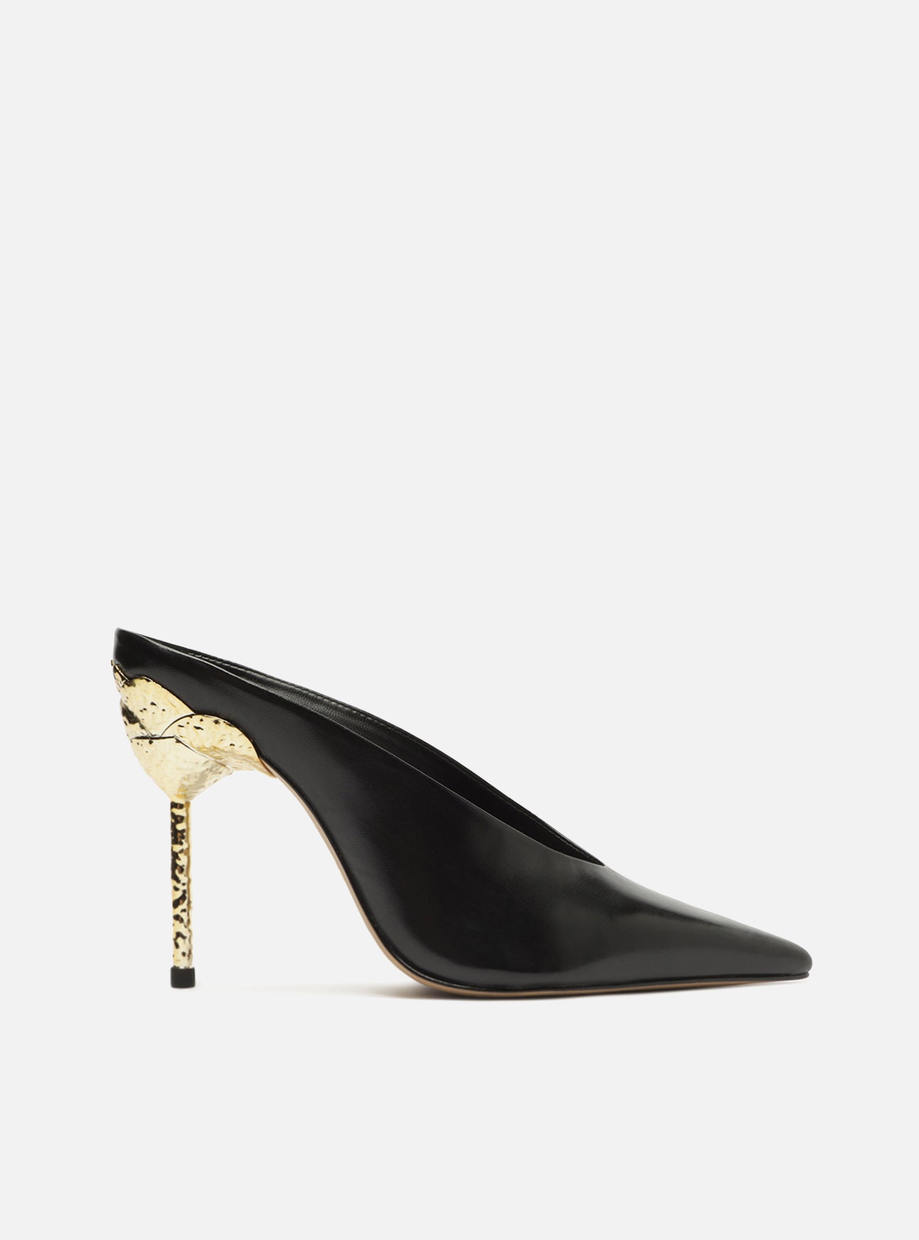 Black leather pump features a high stiletto heel in gold metal with a hammered effect and a pointed toe. With V-cut on the vamp.