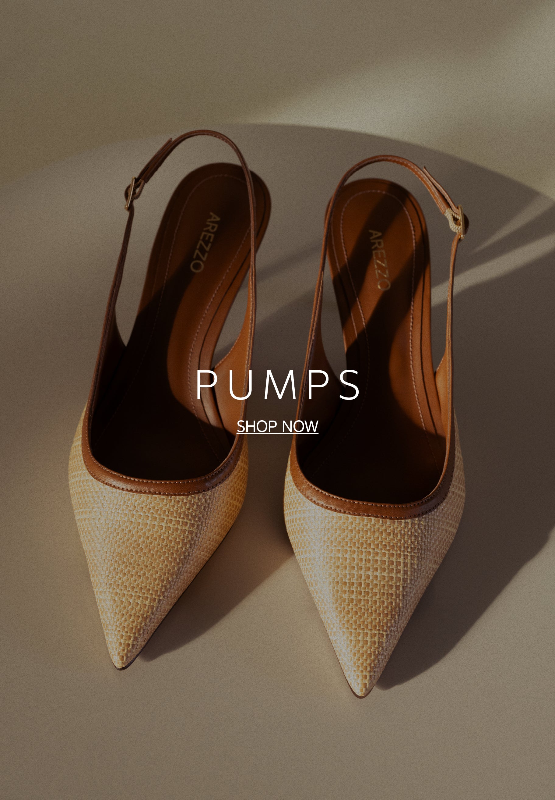 Pair of woven slingback pumps in warm neutral tones styled under soft sunlight.