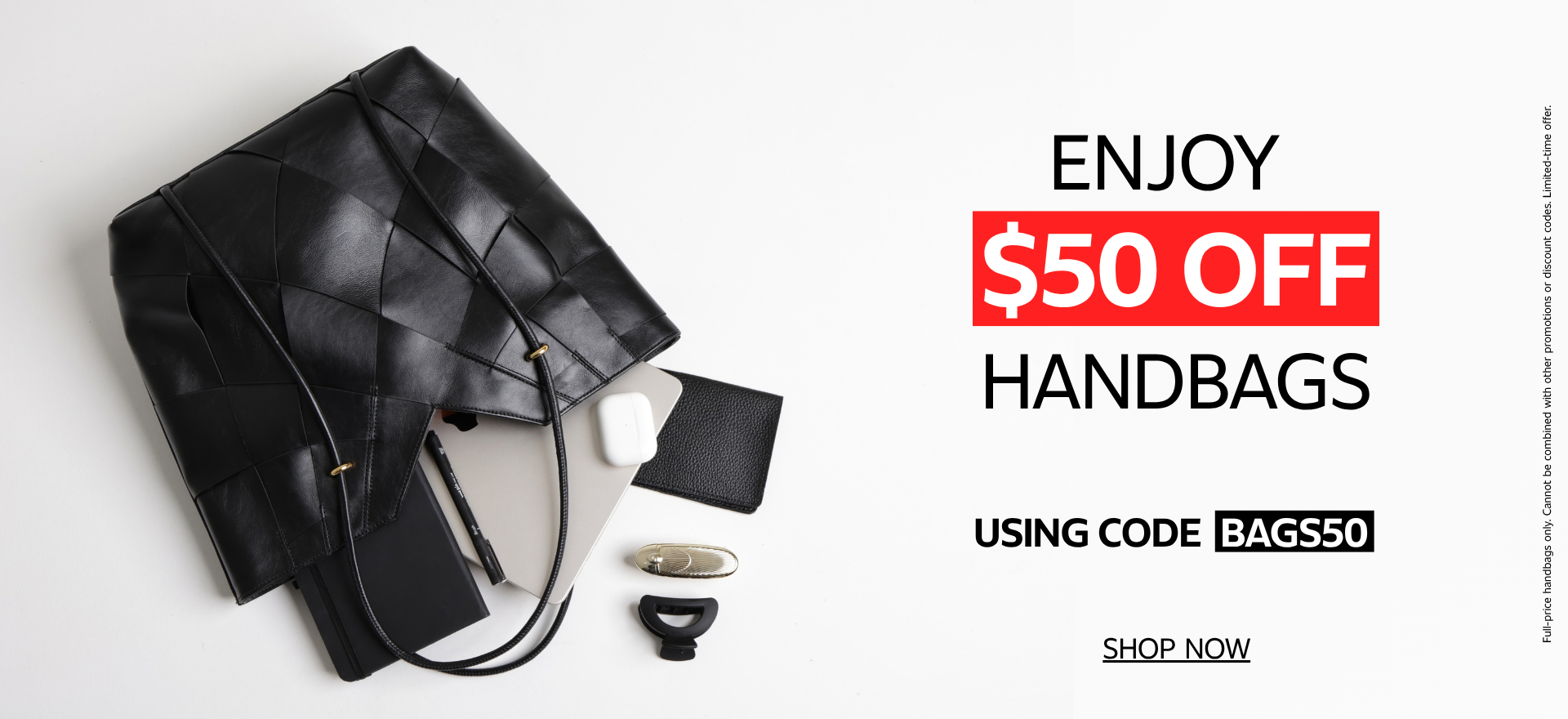 Black leather handbag styled with a laptop, tablet, earbuds, notebook and pen, with text promoting $50 off full-price handbags with code BAGS50.