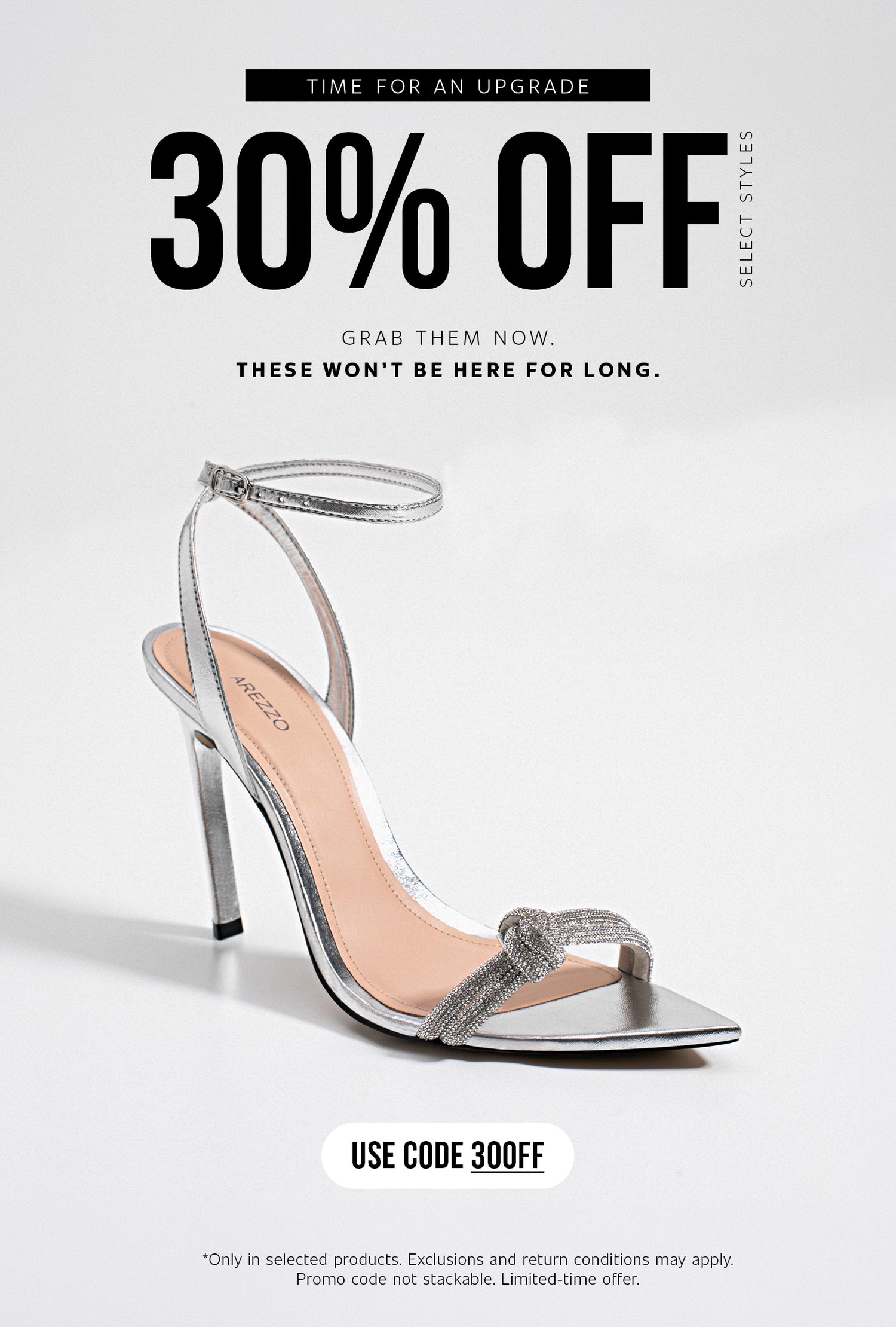 Homepage banner featuring a metallic silver high-heel sandal with rhinestone detail, promoting 30% off select styles with code 30OFF for a limited-time sale.