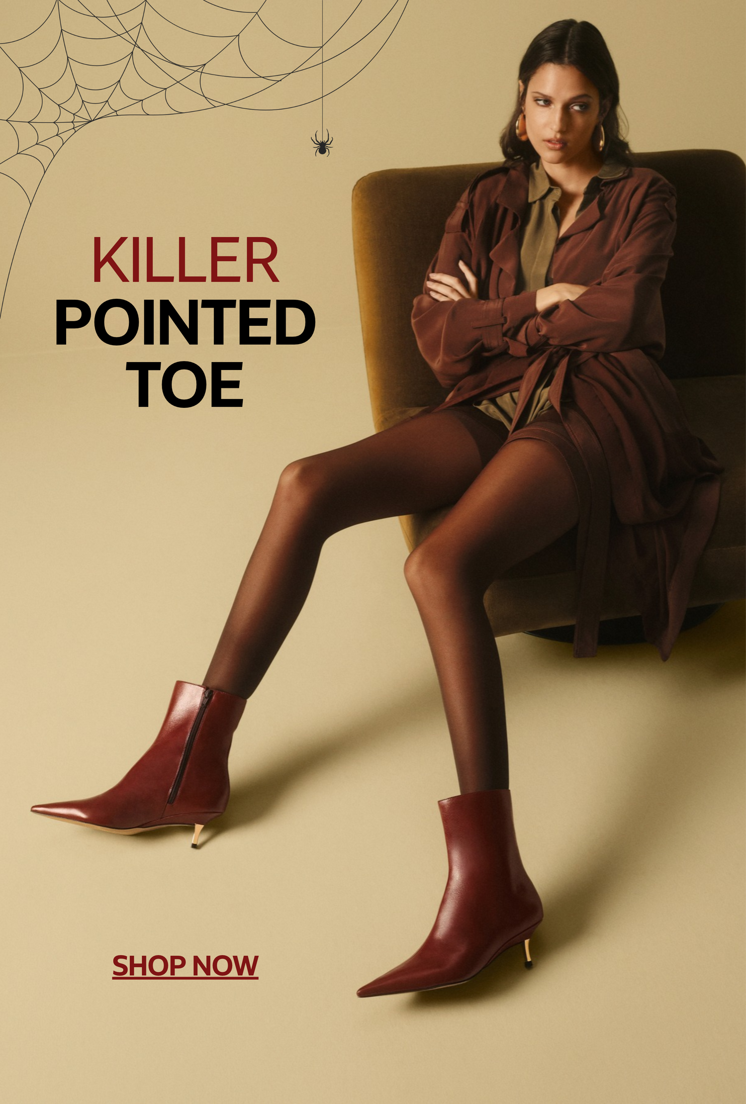 Model wearing burgundy pointed-toe ankle boots with slim heels, seated in a brown armchair against a beige background with a spiderweb graphic. Text reads “Killer Pointed Toe” and “Shop Now.”